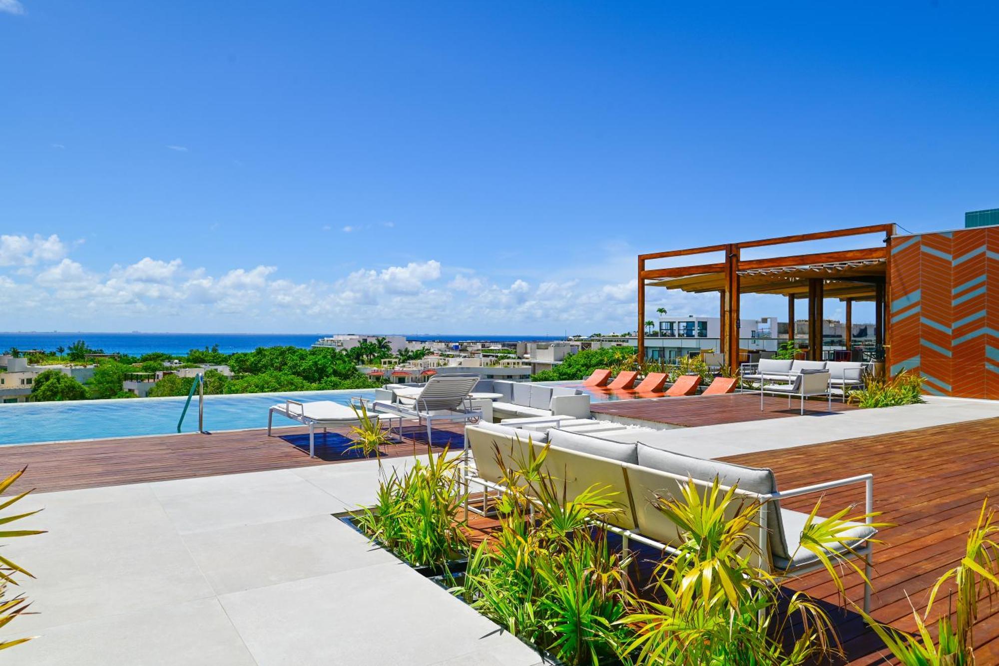 Hotel Aloft Playa Del Carmen Exterior foto Rooftop pool at the Grand at Moon Palace